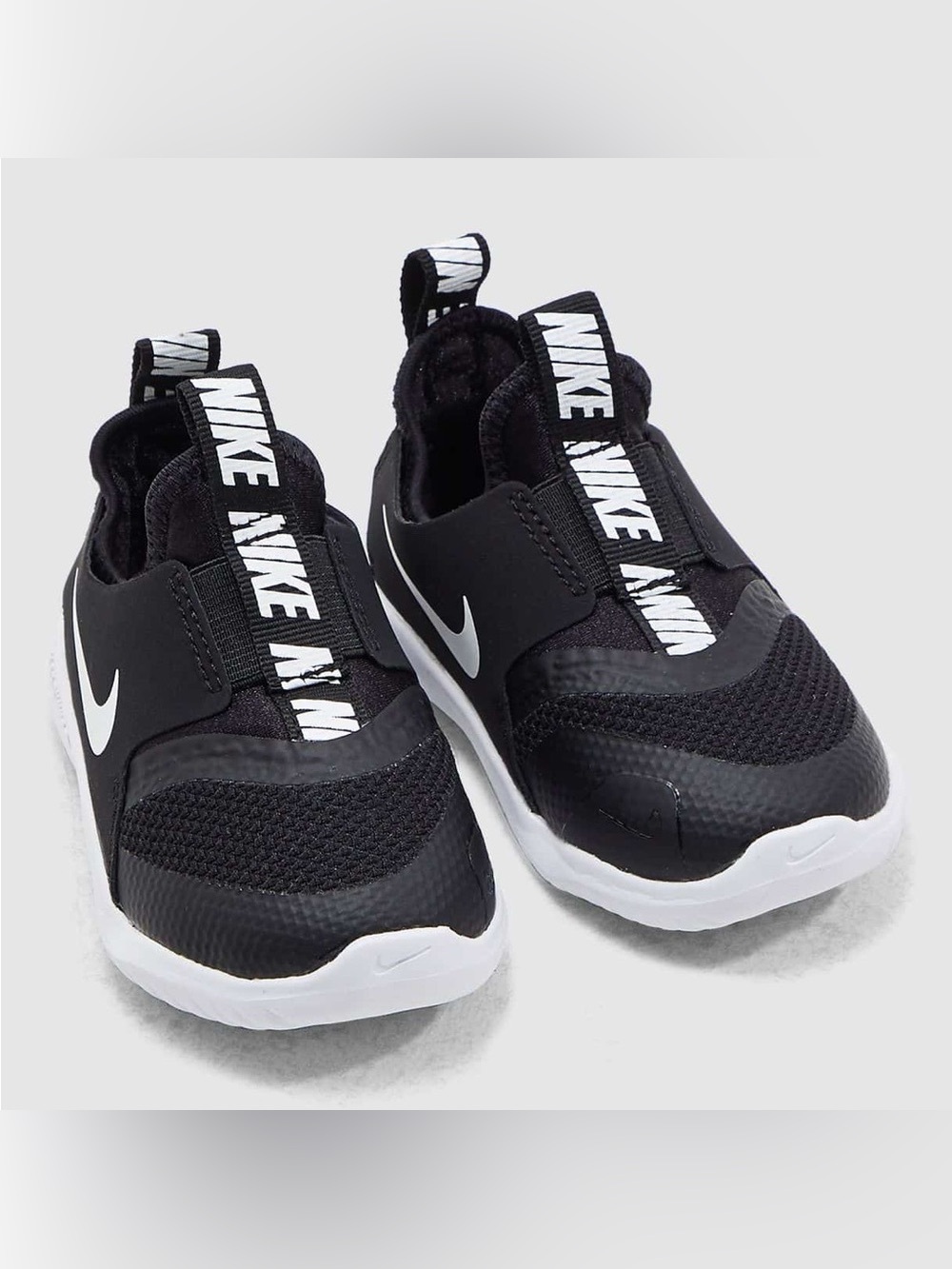 Nike Toddler Black and White Flex Runner Slip-On Sneakers